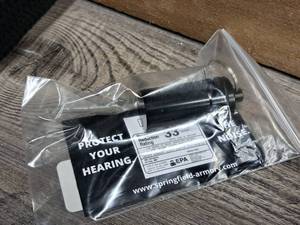 lot 259 image: Springfield Armory 33dBNRR Keychain Earplug Holder with Foam Earplugs