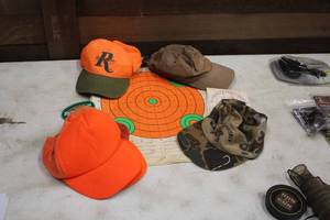 lot 321 image: Misc. Outdoorsman Supplies - Targets, Hats, Patches