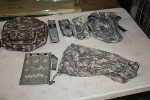 lot 405 image: Assorted Military Camo Backpack, Bags, Belt Accessories, 200 Round Saw Gunner Pouch Molle II