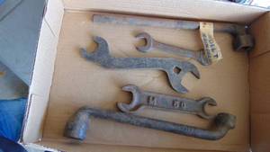 lot 10 image: Lot of Misc Wrenches, John Deere, Yamaha, and a Model T Main Bearing