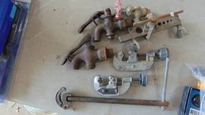 lot 53 image: Lot of Bass Pipe Ends, Pipe Cutters and Pipe Wrench