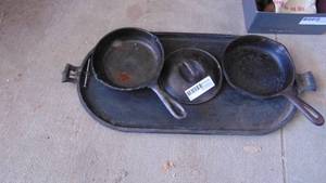 lot 120 image: Cast Iron Griddle and 2 Pans  Lid