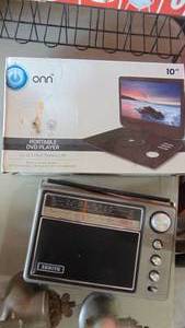 lot 127 image: Portable DVD Player and Zenith Radio