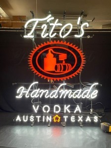 lot 74 image: Titos Handmade Vodka neon