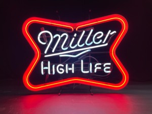 lot 100 image: Miller High Life with red bowtie on gold frame