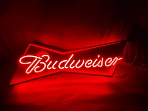 lot 110 image: Budweiser bowtie on burgundy background, this ones a stunner