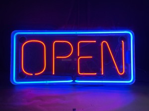 lot 113 image: OPEN neon sign on clear plastic background