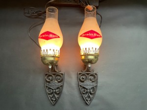 lot 136 image: Lot of 2 Grain Belt Beer glass sconces with cast metal brackets