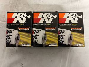 lot 77 image: 3 K&N Performance Gold Oil Filters