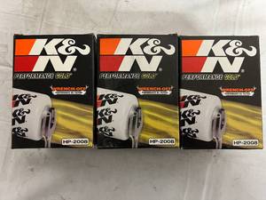 lot 79 image: 3 K&N Performance Gold Oil Filters