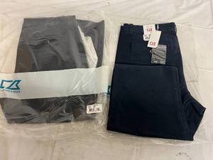 lot 142 image: 2 Pairs of Black Cutter and Buck Pants - Size 3432