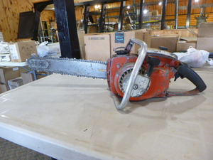 lot 201 image: Remington Gas Chain Saw