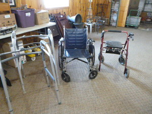 lot 211 image: Wheel Chair and Walkers