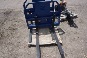 lot 23 image: Brand New KC Brand Universal Mini Skid Loader Toro Dingo, Ditch Witch, Ramrod, Pallet Fork Attachment