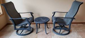 lot 76A image: Two Swivel, Rocking Chairs and a Matching Sturdy Metal Table