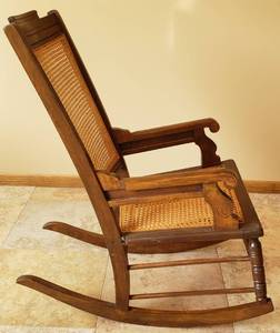 lot 79 image: Antique Rocking Chair wCane Seat and Back