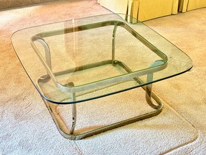 lot 25 image: Elegant Glass Top Coffee Table
