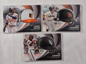 lot 44 image: Lot of 3 2022 Topps Commemorative Batting Helmet Cards Mike Yastrzemski, Cedric Mullins, Tim Anderson