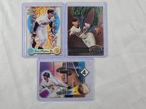 lot 50 image: Lot of 3 Cal Ripken Jr  1999 Crown Royale, 1997 Fleer Metal, Fleer 2000 Die Cut