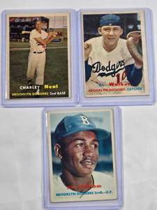 lot 174 image: Lot of 3 Vintage Baseball Cards 1957 Dodgers  Jim Gilliam No. 115, Charley Neal No. 242 (Scratched off), Al Walker No. 147
