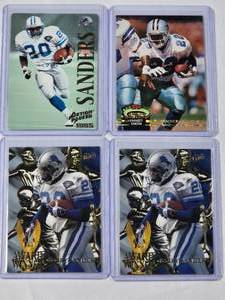 lot 218 image: Lot of 4 Inserts 2x Barry Sanders 95 Fleer Ultra Award Winner, Emmitt Smith 1992 Topps Stadium Club 303, Barry Sanders Action Packed No. 31