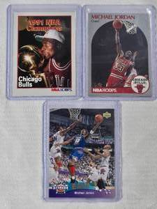lot 263 image: Lot of 3 Michael Jordan Cards 1993 Upper Deck No. 425, 1991 NBA Champions No. 543, 1990 Hoops No. 65
