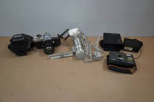 lot 236 image: Vintage Yashica 35mm SLR Camera and Accessories