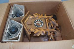 lot 239 image: Vintage Cuckoo Clock with Carved Wood Accents