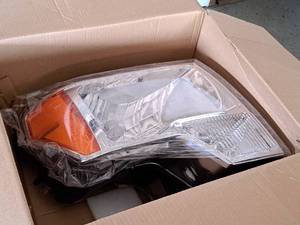 lot 723 image: 2009-2014 Ford F-150 Passenger Headlight (New)