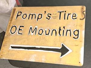 lot 746 image: Pomps Tire OE Mounting logo Metal Sign