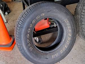lot 715 image: Firestone Wilderness LE 26570R16 Tire