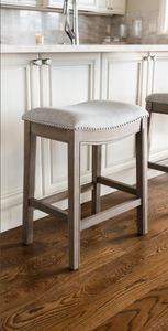 Maven Lane Adrien 26 Inch Counter Height Upholstered Backless Saddle Barstool in Reclaimed Oak Finish with Ash Grey Fabric Cushion Seat