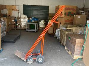 lot 5 image: Tall 4 Wheel Dollly