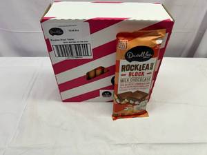 lot 205 image: II. 12x 6.4oz Rock Lea Road Milk Chocolate Block Best by 02032024