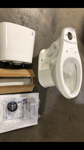 Glacier Bay 12 inch Rough In Two-Piece 1.1 GPF1.6 GPF Dual Flush Elongated Toilet in White Seat Included Customer Returns See Pictures