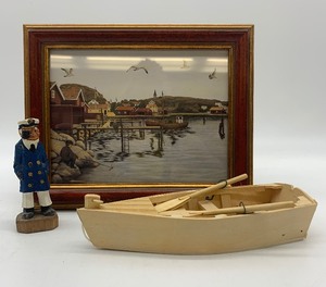 lot 67 image: Seascape Print, Wooden Boat and Hand Carved Wood Captain
