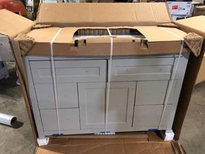 Home Decorators Collection Clady 49 in. W x 19 in. D x 35 in. H Single Sink Freestanding Bath Vanity in Gray with Silver Ash Cultured Marble Top    Customer Returns See Pictures