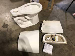 Glacier Bay 12 inch Rough In Two-Piece 1.1 GPF1.6 GPF Dual Flush Round Toilet in White Seat Included  Customer Returns See Pictures