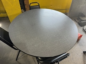 lot 20 image: Lunchroom Table 48 Diameter and Three Chairs