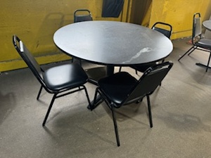 lot 21 image: Lunchroom Table 48 Diameter and Four Chairs