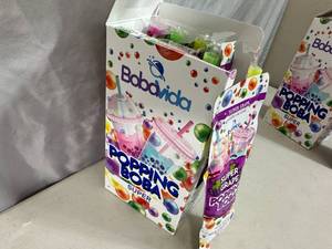 lot 250 image: New Box of 10 Pouches Popping Boba Balls - Super Grape
