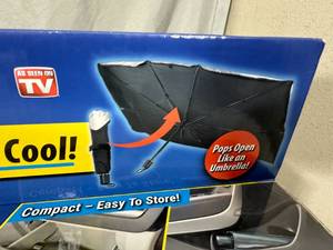 lot 308 image: New Brella Shield Compact Windshield Sun Shade