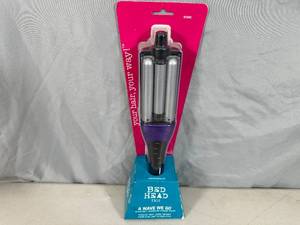 lot 67 image: New Tigi BedHead A Wave We Go