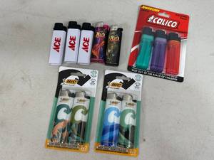 lot 211 image: 12 New Assorted Lighters