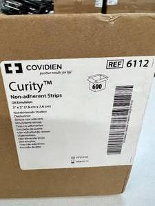 lot 61 image: MSRP $400  1 Case (600 each) NEW Covidien 6112 3 x 3 Curity Oil Emulsion Non-Adhesive Strips - Expiration 528