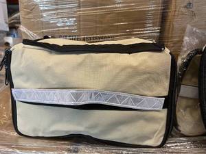 lot 98 image: 12 Cases (100 each per case) NEW Padded Circuit and Accessory Cases - Tan
