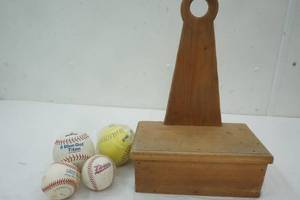 lot 22 image: Homemade Shoe Polishing block and variety of baseballs