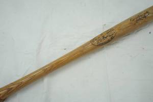 lot 28 image: Louisville slugger bat, 23