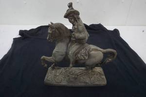 lot 32 image: Cast Metal Man on a Horse