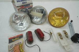 lot 34 image: Headlamps, and vintage lights, dremel bracket